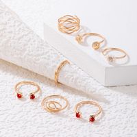 Fashion Imitation Ruby Inlaid Open Flower Alloy Ring Seven-piece Set main image 4