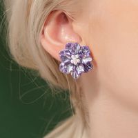 Simple Style Three-dimensional White Flower Pearl Stud Earrings sku image 1