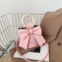 2022 Spring New Fashion Female Cylinder Retro Small Shoulder Crossbody Bowknot Bag main image 2