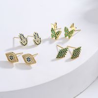 New Style Copper Gold Plated Micro Inlaid Zircon Eyes Butterfly Palm Stud Earrings main image 1