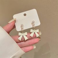 1 Pair Sweet Bow Knot Plating Artificial Pearl Alloy Drop Earrings main image 1