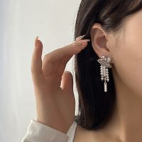 Fashion Retro Baroque Pearl Tassel Dried Small Flower Non-piercing Ear Hooks Women main image 3