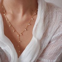 Mode Simple Perle De Longues Femmes Étoilé Main Pendaison Perle De Cuivre Collier main image 4