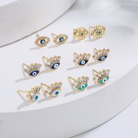 Fashion Plating 18k Gold Micro Inlaid Zircon Eye Copper Ear Stud Earrings main image 1