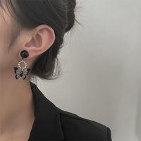 New Style Black Hollow Butterfly Pendant Alloy Earrings main image 1