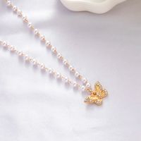 Fashion Elegant Imitation Pearl Beaded Rhinestone Inlaid Butterfly Pendant Clavicle Chain Necklace main image 3