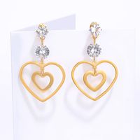 New Trendy Golden Hollow Heart Shape Electroplated Stainless Steel  Zircon  Earrings sku image 1