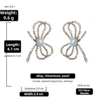 Wholesale Fashion Inlaid Rhinestone Pearl Bow Earrings Nihaojewelry sku image 3