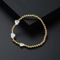 Mode Shell Herz Elastische Perle Gold Intarsien Zirkon Kupfer Armband main image 2