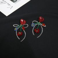 Fashion New Heart-shaped Red Flower Bead Bow Acrylic Earrings main image 2