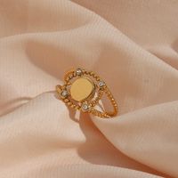 Fashion Retro Women's Plated 18k Golden Hollow Four-corner Diamond Stainless Steel Ring main image 5