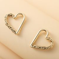 Simple Style Asymmetric Hollow Heart-shaped Metal Stud Earrings main image 2
