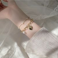 Mode Süss Herz Legierung Eingelegte Perlen Künstliche Perlen Frau Armbänder main image 1