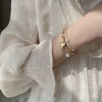 Mode Süss Herz Legierung Eingelegte Perlen Künstliche Perlen Frau Armbänder main image 2