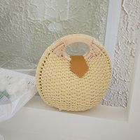 New Retro Style Hand-held Hand-carrying Round Straw Bag main image 2