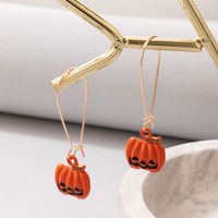 Fashion Ornament Halloween Pumpkin Grimace Ear Hook Irregular Alloy Earrings sku image 1
