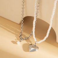 Mode Retro Nachahmung Perle Doppel-schicht Geometrische Herz Form Hohl Harz Metall Halskette Set main image 6