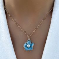 Fashion Blue Drop Oil Pearl Inlaid Small Five-petal Flower Necklace sku image 1