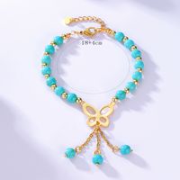 Mode Simple En Acier Électrolytique 18k D'or Papillon Creux Pendentif Turquoise Bracelet main image 3