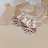 Fashion Inlay Rhinestone Artificial Pearl Fully-jewelled Bow Earrings main image 3