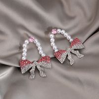 Fashion Inlay Rhinestone Artificial Pearl Fully-jewelled Bow Earrings main image 1