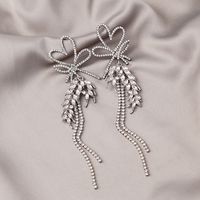 Fashion Geometric Heart Shaped Ribbon Wheat Tassel Long Alloy Earrings main image 4