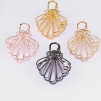 Fashion Simple Metal Inlay Pearl Barrettes Shell Shaped Hollowed-out Grip main image 2