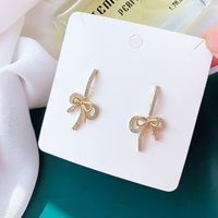 Simple Style Bow Shape Tassel Copper Inlaid Zircon Earrings main image 2