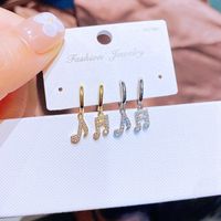 Fashion Micro Inlaid Zircon Notes Ear Clip Gold Plated Jewelry Wholesale main image 1