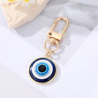Fashion Alloy Inlaid Resin Eye Shaped Keychain Round Blue Eyes Bag Pendant Accessories sku image 1
