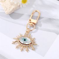 Fashion Alloy Inlaid  Rhinestone Eye Shaped Keychain Electroplated Gold Handbag Pendant main image 3