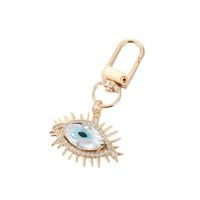 Fashion Alloy Inlaid  Rhinestone Eye Shaped Keychain Electroplated Gold Handbag Pendant main image 4