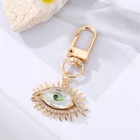 Fashion Alloy Inlaid  Rhinestone Eye Shaped Keychain Electroplated Gold Handbag Pendant sku image 1