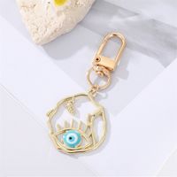 Fashion Alloy Hollow Dripping Keychain Round Geometric Blue Eyes Bag Pendant Accessories sku image 2