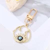 Fashion Alloy Hollow Dripping Keychain Round Geometric Blue Eyes Bag Pendant Accessories sku image 3