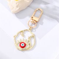 Fashion Alloy Hollow Dripping Keychain Round Geometric Blue Eyes Bag Pendant Accessories sku image 5