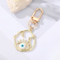 Fashion Alloy Hollow Dripping Keychain Round Geometric Blue Eyes Bag Pendant Accessories sku image 6