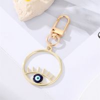 Fashion Alloy Hollow Dripping Keychain Round Geometric Blue Eyes Bag Pendant Accessories sku image 8