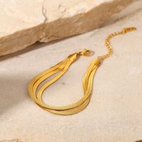 Einfache Drei-schicht Flache Schlange Knochen Kette 18k Gold Überzogene Edelstahl Armband main image 4