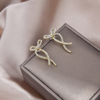 Front Rear Dual-wear Cross Earrings Irregular Diamond-embedded Bow Stud Earrings sku image 1