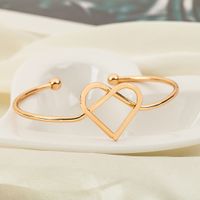 Simple Woven Love Heart Open-end Bracelet Fashion Geometry Cross Couple Metal Bracelet main image 2