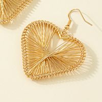 Simple Style Hollow Striped Three-dimensional Heart-shaped Pendant Earrings main image 5