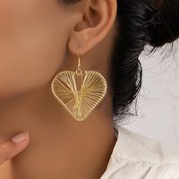 Simple Style Hollow Striped Three-dimensional Heart-shaped Pendant Earrings main image 1