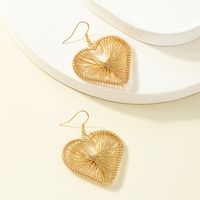 Simple Style Hollow Striped Three-dimensional Heart-shaped Pendant Earrings main image 4
