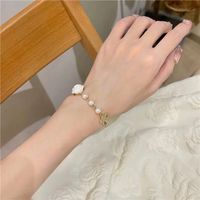 Fashion New Style Hollow Butterfly Inlaid Rhinestone Camellia Flower Pearl Bracelet main image 5