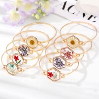 Simple Style Flowers Alloy Plating Resin Bangle main image 1