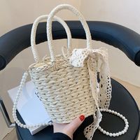 Women's Straw Solid Color Vacation Fashion Pearl Bowknot Bucket Shape Zipper Handbag Crossbody Bag main image 4
