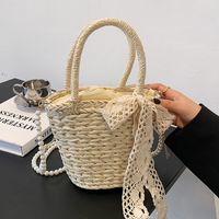 Women's Straw Solid Color Vacation Fashion Pearl Bowknot Bucket Shape Zipper Handbag Crossbody Bag main image 2