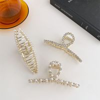 Women's Vintage Style Simple Style Geometric Metal Headwear Plating Artificial Rhinestones Artificial Pearl Hair Claws main image 2