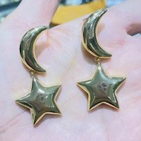 Femmes Mode Star Lune Le Cuivre Pas D'incrustation Boucles D'oreilles Placage Métal Boucles D'oreilles main image 4